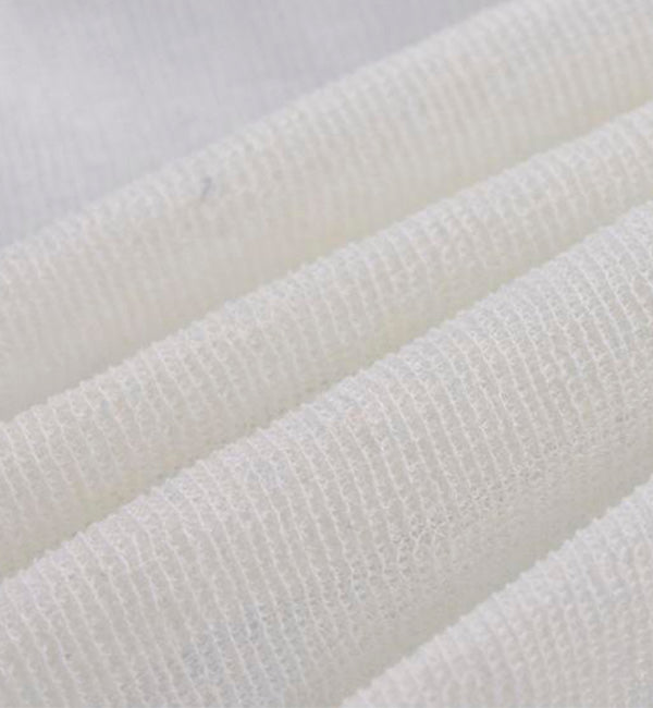 a closeup image of fiberglass fabric used in competitors mattresses