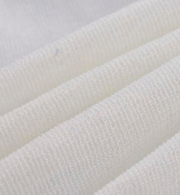 a closeup image of fiberglass fabric used in competitors mattresses